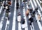 Group of pedestrians crossing the street