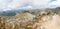 Group people ascending mountain panorama.