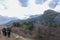 Group people backpacks mountains clouds