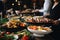 Group Of People Catering Buffet Food Indoors In Restaurant, Featuring Variety Of Meats, Colorful Fru