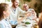 Group of people celebrating event in restaurant