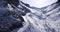 A group of people climb the snowy peak. Snow path and a group of people.