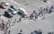 Group of people crossing a high traffic avenue in Beijing, China