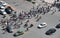 Group of people crossing a high traffic avenue in the city of Be