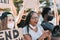 Group of people demonstrators protest in city street against racism - Equal rights fighting and black lives matter campaign