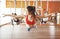 Group of people engaged in a class of yoga Aero in hammocks antigravity