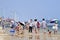 Group of people enjoy activities on the beach, Yantai, China