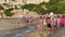 Group of people enjoying their summer holiday on the beach