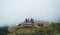 Group of people hikers standing on a high viewpoint in Doi Inthanon park