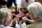 Group of people holding hands praying worship believe