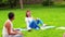 Group of people meeting for yoga class at park