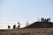 Group of people on outlook post on mountain top