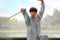 group of people practice Chinese sword with Tai Chi Chuan in a park