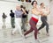 Group of people practicing energetic lindy hop movements