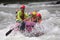 Group of people rafting and rowing on river with splash water August 28,2011 in Thailand