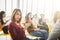 Group of people sitting and waiting for meeting .Asian woman using smartphone.