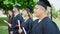 Group of people students graduated holding diploma at university campus