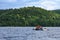 group of people swimming on a catamaran and boat during rafting on the reservoir