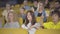 Group of people throwing popcorn in cinema. Portrait of angry film-lovers dissatisfied with film. Men and women of