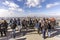 Group of people visits the Main Tower skyscraper inf Frankfurt