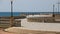 Group of people walking on the seafront of Livorno. The  Mascagni terrace is a famous place and meeting place for the citizens of