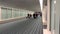 A group of people walking to their gate at Orlando International airport
