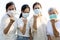 Group of people wearing medical mask to prevent infection from spreading of Covid-19,asian family raised a fists and prepare for