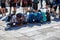 Group of Pilgrim backpack in a row on paving stone of Obradoiro square, Santiago de Compostela, Spain