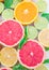 Group of pink grapefruits, lime, orange and lemons