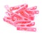 Group of plastic pink clothespin