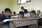 Group Portrait of Bolivian children writing in the