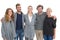 Group portrait of happy people standing with arms around