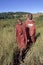 Group portrait laughing Maasai mother with son