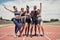 Group portrait, sports medals and people at stadium after winning running race or event outdoors. Winner, award and