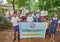 Group of primary students on road, rural students joined a procession to fight for climate change