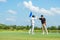 Group Professional Golfer asian man shake hand for friendship after finish put ball on green. Hobby relax in holiday and vacation