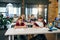 Group of pupils primary school sitting at the desks and pass exam at classroom of modern smart school.