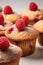 a group of raspberry muffins, created by Generative AI