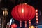 Group of red chinese lanterns illuminated at night