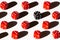 Group of red and one black dices on white background with shadow isolated. Command work and leadership concept