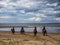 Group riding horses in the wadden sea