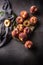 A group a ripe peaches in rustic bowl