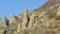 A group of rocks in mountains of Asia. Shot. Beautiful landscape and clear blue sky