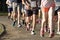 Group of runners racing a 5K on a dirt path