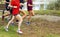 Group of runners training nest to a lake