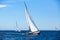 Group of sail yachts in regatta in open the Sea. Boat in sailing regatta.