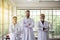 Group of scientist people standing and cross arms together in laboratory,Successful teamwork concept