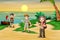 Group of scout on the beach background