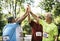 Group of senior athletes giving a high five