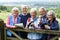 Group Of Senior Friends Hiking In Countryside